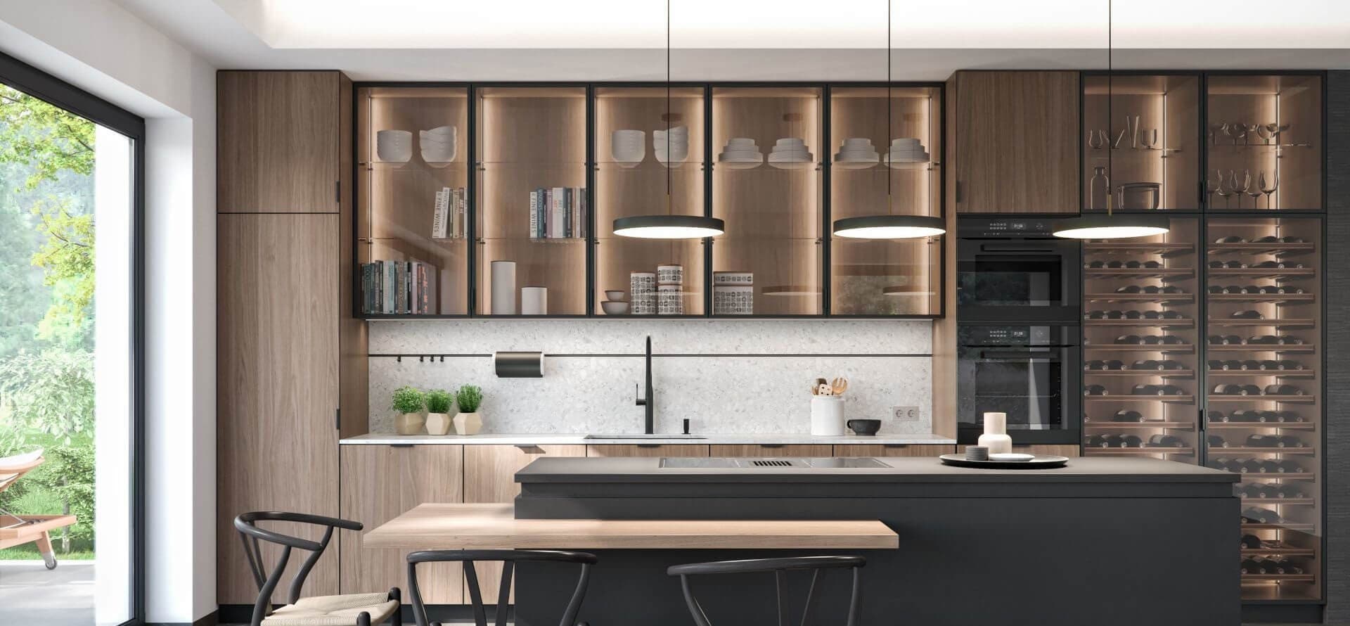 Kitchen with black aluminum frame glass cabinet doors and lit interiors